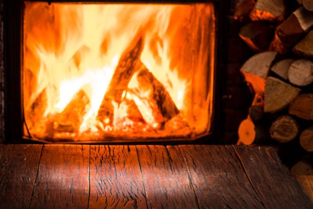 Compare the pros and cons of electric and wood-burning fireplaces to determine the best choice for your home.